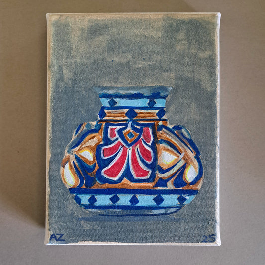 Plateelvaasje met rood/blauw decor